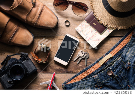 Travel accessories on wooden  ready for travel 42385058