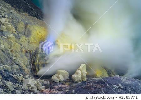 Blue sulfur flames and Sulfur fumes Blue sulfur flames and Sulfur fumes 42385771