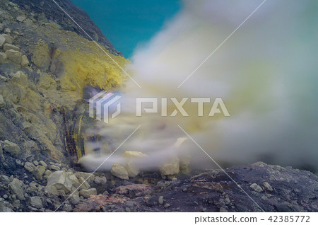 Blue sulfur flames and Sulfur fumes 42385772