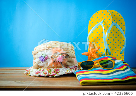 accessories for summer on wooden blue background accessories for summer on wooden blue background 42386600