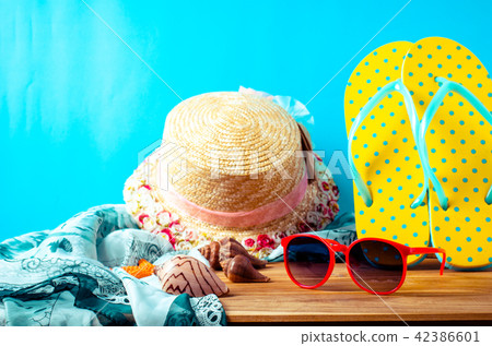 accessories for summer on wooden blue background accessories for summer on wooden blue background 42386601