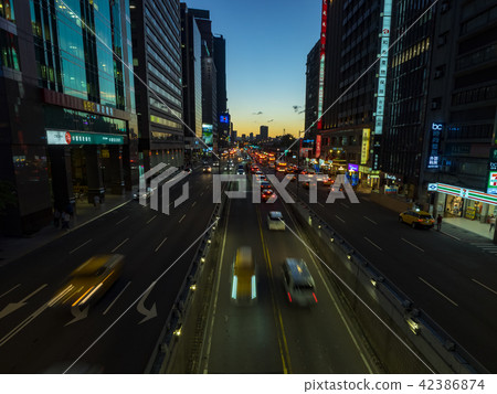 Sunset over modern office buildings in taipei 42386874