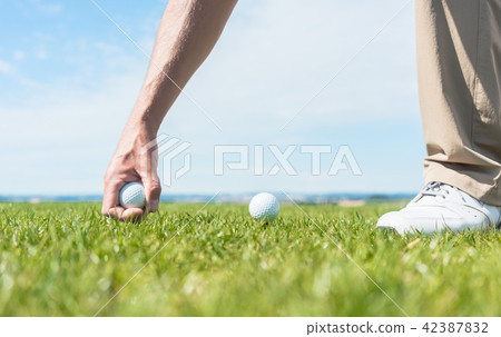 Close-up of the hand of a professional male player taking a ball 42387832