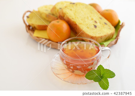 Delicious bread and tea 42387945