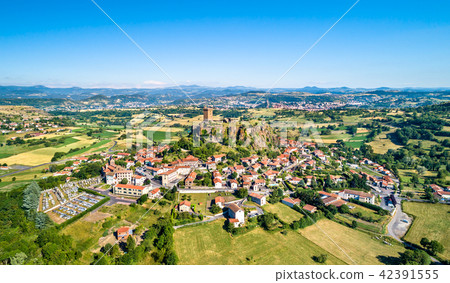 View of Polignac village with its fortress. Auvergne, France 42391555