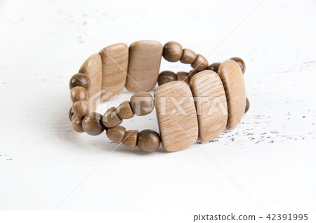 Vintage wooden braclet on white 42391995