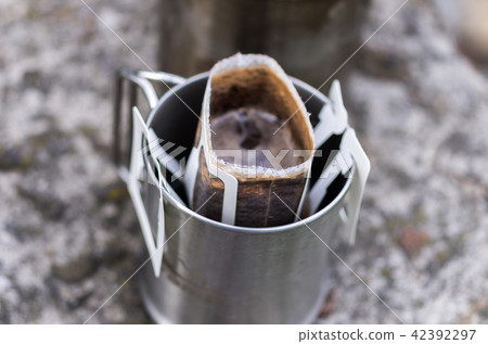 Brewed black coffee in a mug. 42392297