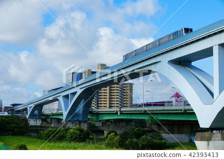 Fan Ohashi bridge over Arakawa and Territor Liner Fan Ohashi bridge over Arakawa and Territor Liner 42393413
