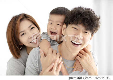 happy family mother, father and child playing happy family mother, father and child playing 42393919