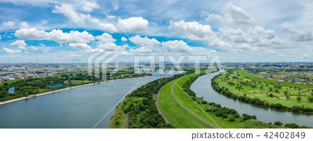 Aerial view of Toda City Doman Green Park, looking towards the city center over Sai Lake Aerial view of Toda City Doman Green Park, looking towards the city center over Sai Lake 42402849