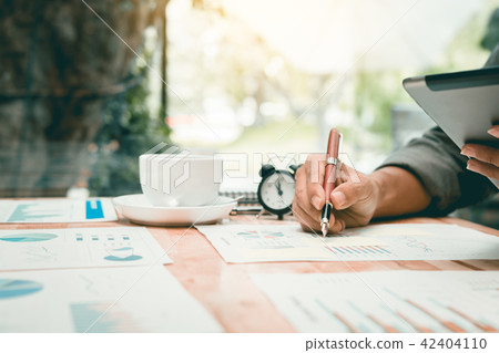Businessman writing make note on desk office Businessman writing make note on desk office 42404110