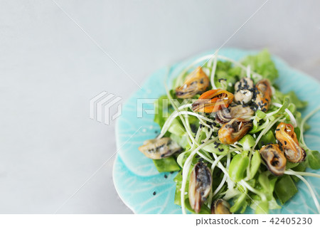 Yummy thai salad with mussels, light background with copyspace. Yummy thai salad with mussels, light background with copyspace. 42405230