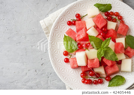 Salad of fresh juicy pieces of watermelon, melon Salad of fresh juicy pieces of watermelon, melon 42405446