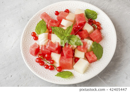 Salad of fresh juicy pieces of watermelon, melon Salad of fresh juicy pieces of watermelon, melon 42405447