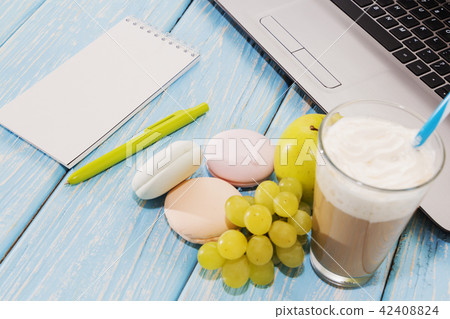 open notebook, white mug with coffee, marshmallows. open notebook, white mug with coffee, marshmallows. 42408824