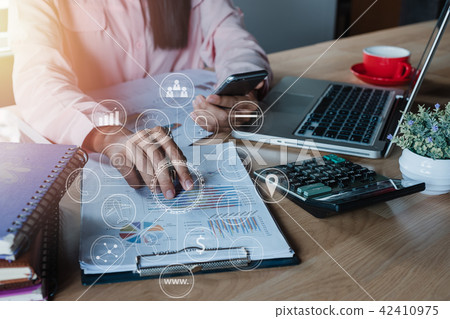 Businesswoman working with smart phone Businesswoman working with smart phone 42410975