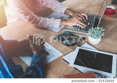 Two colleagues discussing data  42410988