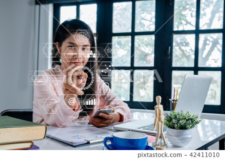 Business woman hand holding pen Business woman hand holding pen 42411010