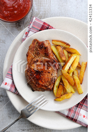 pork steak on dice with potatoes pork steak on dice with potatoes 42411334