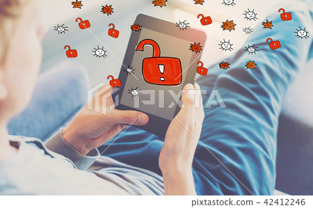Unlock theme with man using a tablet  42412246