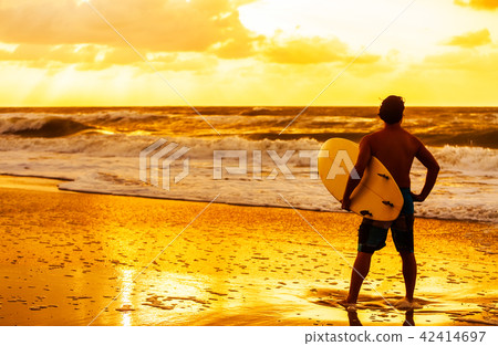 Male Man Surfer & Surfboard Sunset Sunrise Beach 42414697