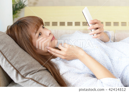 Woman with smartphone Woman with smartphone 42414812