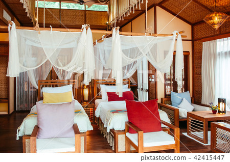 Bedroom interior four poster bed colourful pillows Bedroom interior four poster bed colourful pillows 42415447