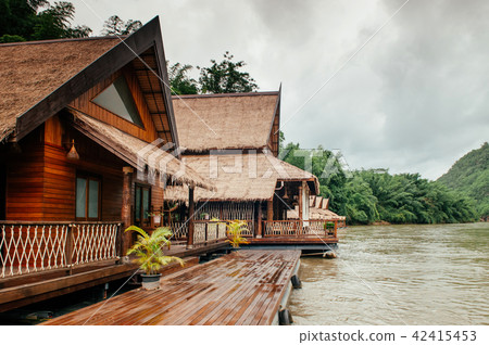 Wooden floating house in river Kwai, Kanchanaburi Wooden floating house in river Kwai, Kanchanaburi 42415453