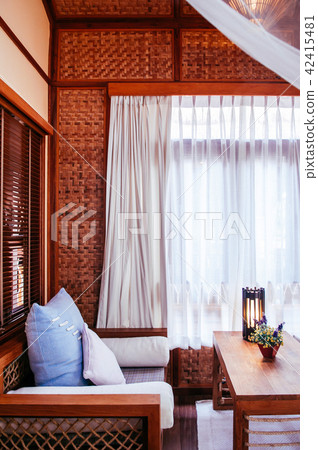 Asian living room wooden interior and couch  42415481