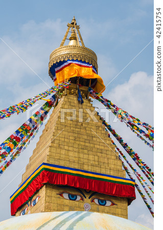Boudhanath Stupa and prayer flags in Kathmandu Boudhanath Stupa and prayer flags in Kathmandu 42415754