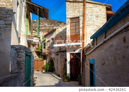 Old houses on the narrow street of the village Old houses on the narrow street of the village 42416261