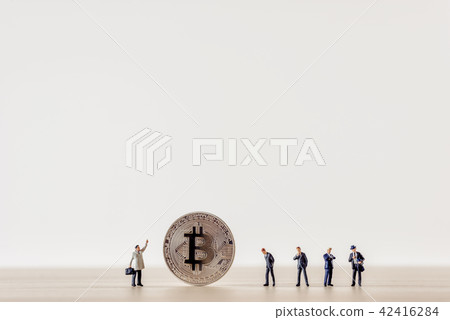 Business team with bitcoinwith some copyspace  42416284