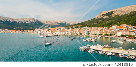 Aerial panoramic view of Baska town, popular touristic destination on island Krk, Croatia, Europe 42418810