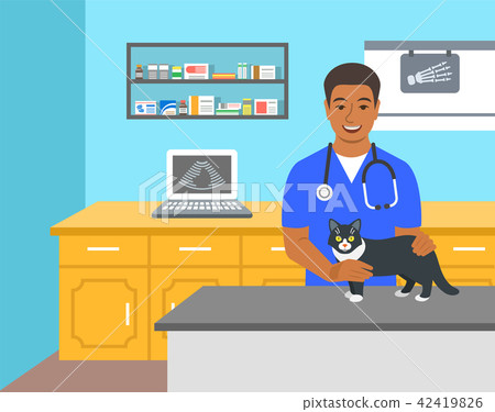 Veterinarian doctor holds dog on examination table 42419826