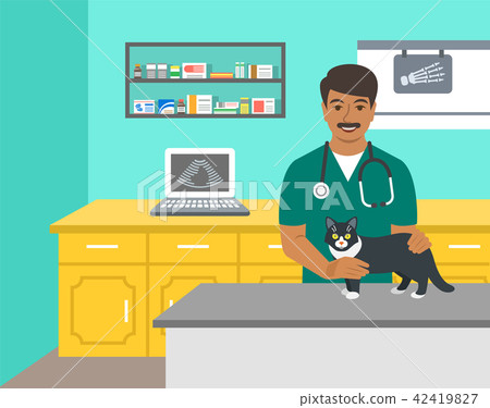 Veterinarian doctor holds dog on examination table Veterinarian doctor holds dog on examination table 42419827