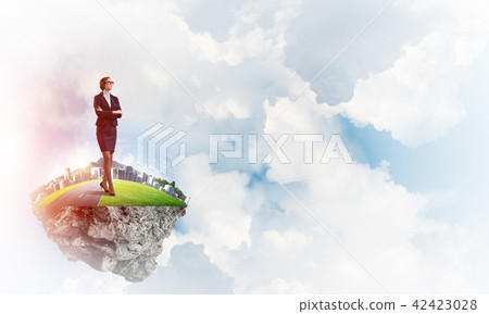 Confident lady boss and modern city as concept of eco green construction 42423028
