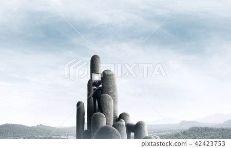 Businessman with TV instead of head. 42423753