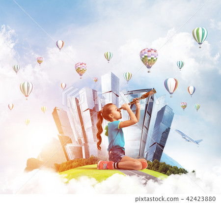 Concept of careless happy childhood with girl looking in future Concept of careless happy childhood with girl looking in future 42423880