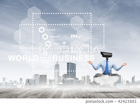 Camera headed man sitting in lotus pose on cloud against modern cityscape Camera headed man sitting in lotus pose on cloud against modern cityscape 42423881