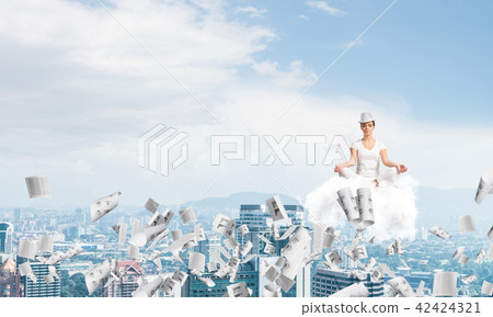 Young woman keeping mind conscious. Young woman keeping mind conscious. 42424321