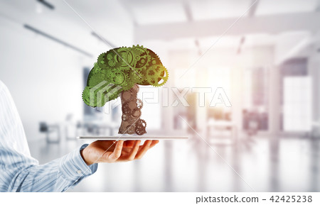 Eco green environment concept presented by tree as working mechanism or engine Eco green environment concept presented by tree as working mechanism or engine 42425238
