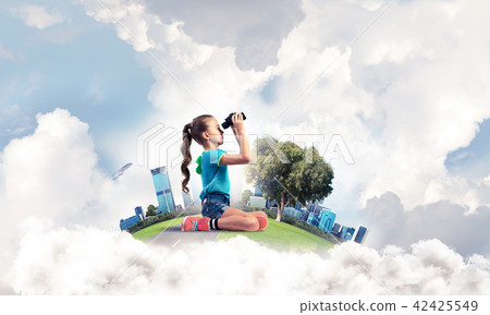 Concept of careless happy childhood with girl looking in future Concept of careless happy childhood with girl looking in future 42425549