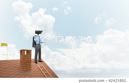 Concept of home security and privacy protection with camera headed man 42425802