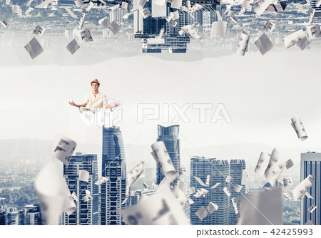 Young man keeping mind conscious. 42425993