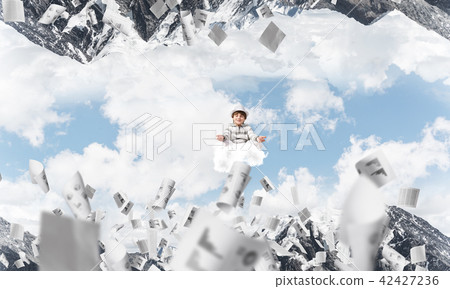 Young boy keeping mind conscious. 42427236