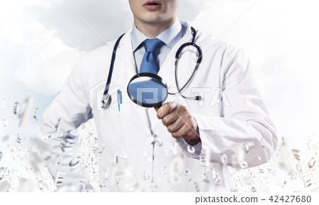 Doctor searching your diseases Doctor searching your diseases 42427680