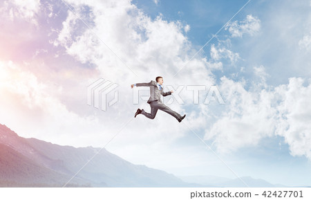 Businessman on the move. 42427701