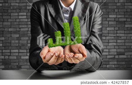 Businessman presenting growing graph. Businessman presenting growing graph. 42427857