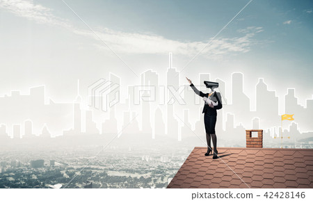 Concept of home security and privacy protection with camera headed woman 42428146