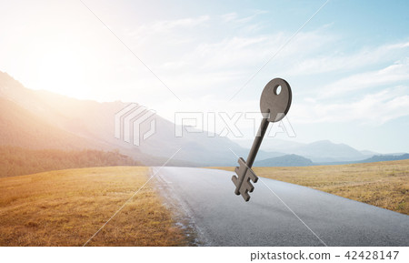 Conceptual background image of concrete key sign on asphalt road Conceptual background image of concrete key sign on asphalt road 42428147